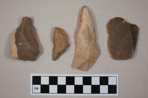 Flint flakes; scrapers; one with cortex; tan and brown colored stone