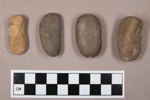 Flint pebbles, including cream, grey and brown colored stone