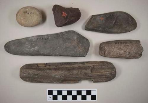 Various ground stone tools and fragments