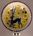 Ceramic blue and yellow on buff glazed talavera ware bowl with deer motif