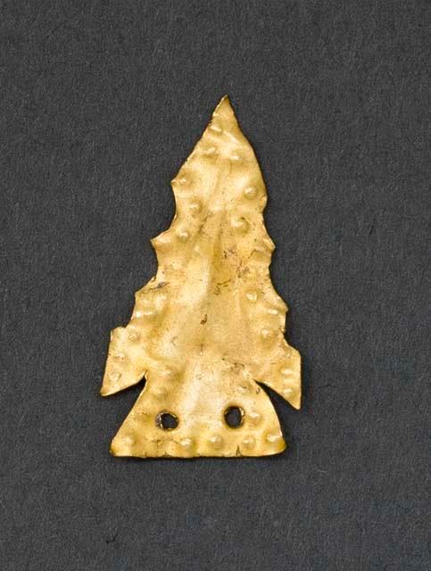 Gold ornament in shape of projectile point