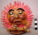 Ceramic polychrome glazed sun and devil effigy whistle