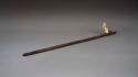 Wooden atlatl with one bone peg and one copper peg