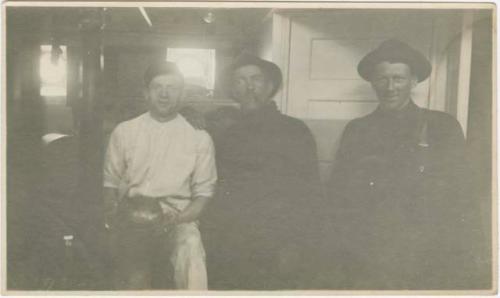 Arctic Voyage of Schooner Polar Bear - Three Men Indoors