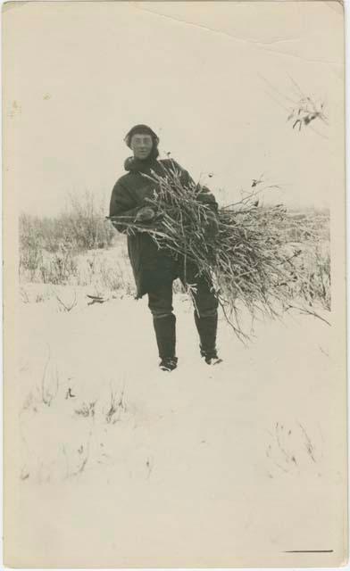 Arctic Voyage of Schooner Polar Bear - Dunbar Lockwood gathering shrubbery for bedding