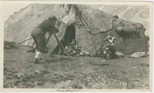 Arctic Voyage of Schooner Polar Bear - Will E. Hudson photographing or filming woman and children