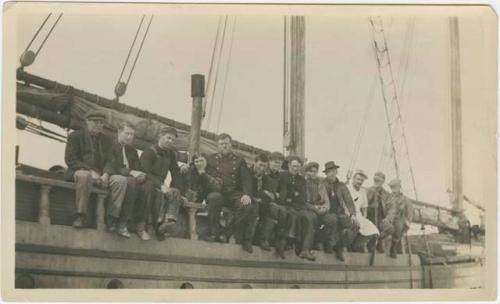 Arctic Voyage of Schooner Polar Bear - (L-R) Ivan Klepnekoff, Sam Mixter, Captain Louis Lane, Russian judge and wife, Dunbar Lockwood, Ben Kilian, George Isbester, Herman Kilian, Ed Morris, French Joe, Sprague Brooks, and Joseph Dixon