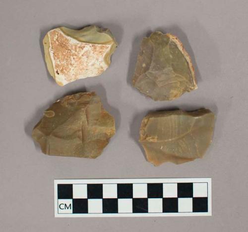 Flint fakes; three with cortex; brown and cream colored stone