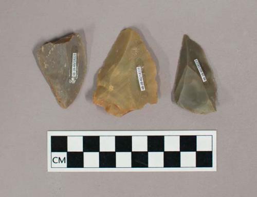 Flint points; gray and tan colored stone