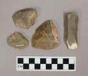 Flint flakes; two with cortex; one balde-like; gray-colored stone