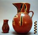 Toy pitchers, one large, pottery, red and black