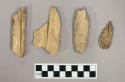 Worked bone fragments, one taperd to rounded end, others with incised lines