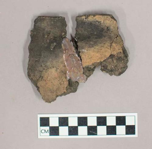 Ceramic, earthenware rim sherds with impressed exterior decoration, pieces mended with plaster