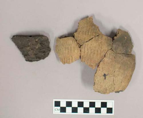 Ceramic, earthenware rim and mended body sherds with impressed exterior decoration