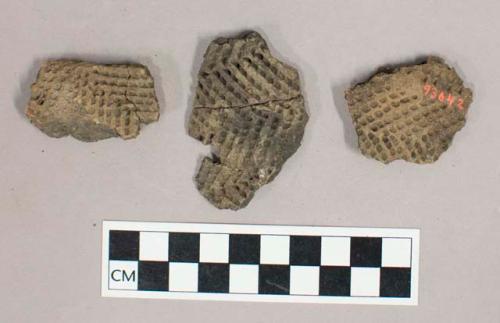 Ceramic, earthenware body sherds with impressed exterior decoration in herringbone motif