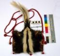 Skunk skin bag for man - red woven wool handle; tassels with white +