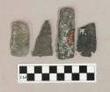 Chipped stone projectile point fragments, including side-notched and corner-notched