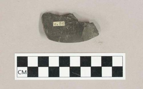 Ground stone, adze blade fragment