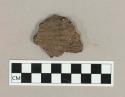 Ceramic, earthenware body sherd with impressed exterior decoration