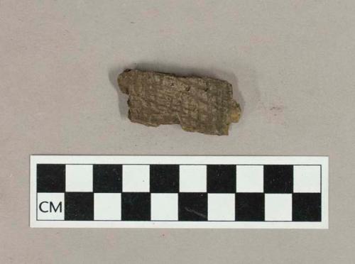 Ceramic, earthenware body sherd with incised exterior decoration