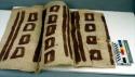 Light patterned woman's tapa cloth with brown stripes