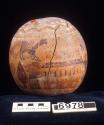 Gourd with cover and carved and painted designs of men with bulls and +