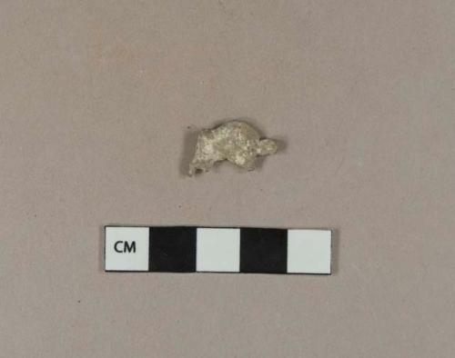 Unidentified lead fragment