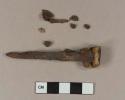 Cut or wrought iron nail; unidentified iron fragments, likely from nail