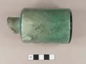 Dip mold aqua glass bottle with an open pontil scar; contents appear to be intact