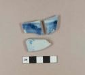 Blue hand painted porcelain body sherds; two sherds crossmend