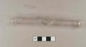 Colorless glass test tube; fragments crossmend, some mended with scotch tape