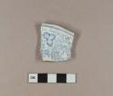 Blue transfer printed whiteware molded rim sherd