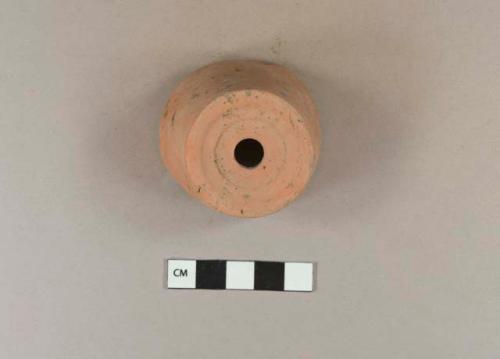 Unglazed redware flowerpot base sherd