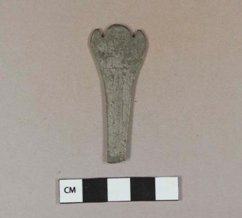 Cupreous, latten spoon handle fragment; three-forked pied de biche end; scratched initials "EW"