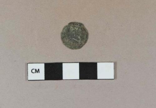 Cuprous coin, intact but corroded, likely farthing