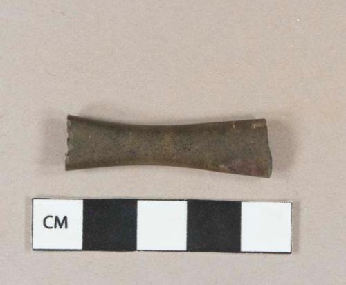 Burned bone toothbrush handle fragment