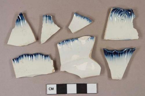 Blue on white shell-edged pearlware vessel rim fragments, white paste