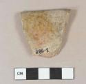 Brown lead glazed earthenware, likely burned redware, vessel rim fragment