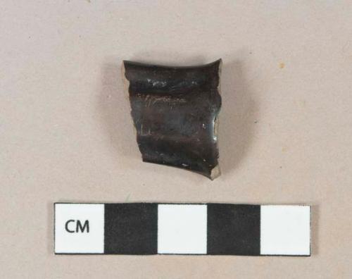 Black lead glazed earthenware vessel handle fragment, gray paste, likely jackfield type