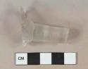 Colorless glass stemware stem fragment