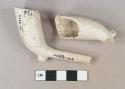 Pipe, white kaolin bowl fragments; stem with bore diameter of 4/64"; both stamped with "TD" in cartouche on bowl, possible maker Thomas Dennis, Bristol, Freeman
