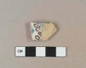 Blue and brown on white handpainted tin glazed earthenware vessel body fragment, buff paste, likely Portuguese faience