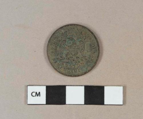 Cuprous alloy intact token, Embossed on 1 side "Manufacturers / of / every / description / of / clothing / and / dealers in / cloths / furnishing goods," and on the other side " Mahonys / 50 Ann stt / Boston / Wholesale clothes warehouse" with Eagle, shield, olive branches, and arrows. Likely "hard luck" token