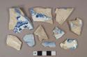 Blue on white transferprinted whiteware vessel body, base, and rim fragments, white paste