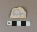 lavender on white handpainted tin-glazed earthenware vessel body fragment, buff past, possibly Portuguese