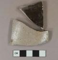 Gray salt-glazed stoneware vessel body fragments, dark brown interior, gray paste
