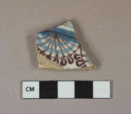 Blue and mangenese on white handpainted tin glazed earthenware vessel body fragment, buff paste, decorated on both sides