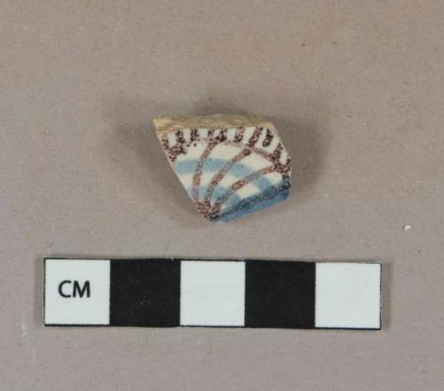 Blue and manganese on white tin glazed earthenware vessel rim fragment, buff paste, likely Portuguese