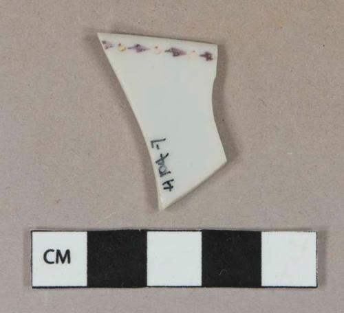 White porcelain vessel rim fragment, white paste, handpainted overglaze purple and orange shapes around rim