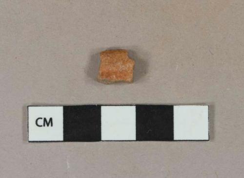 Reddish brown lead glazed redware vesel rim fragment